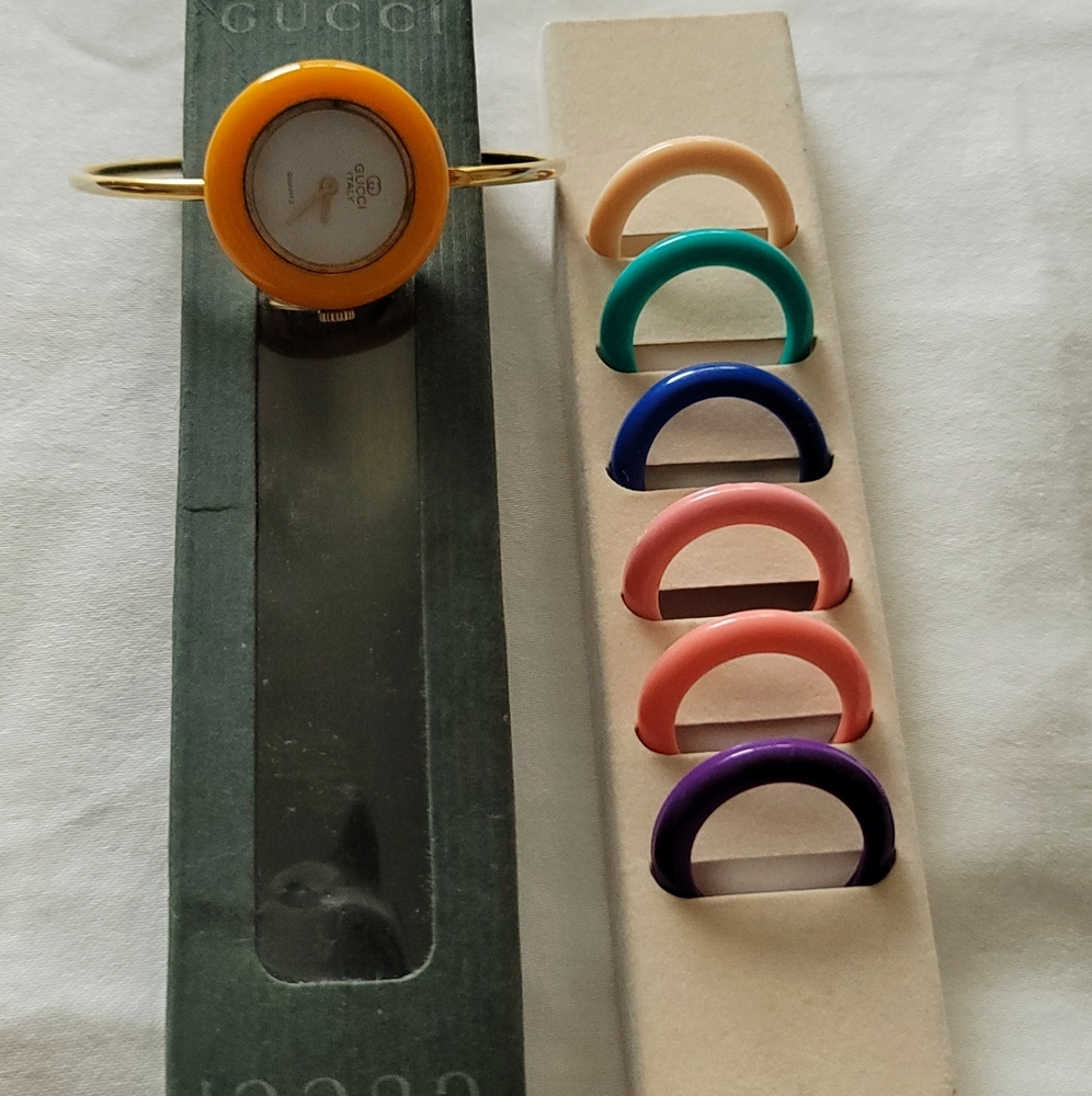 Vintage GUCCI watch with 7 bezels